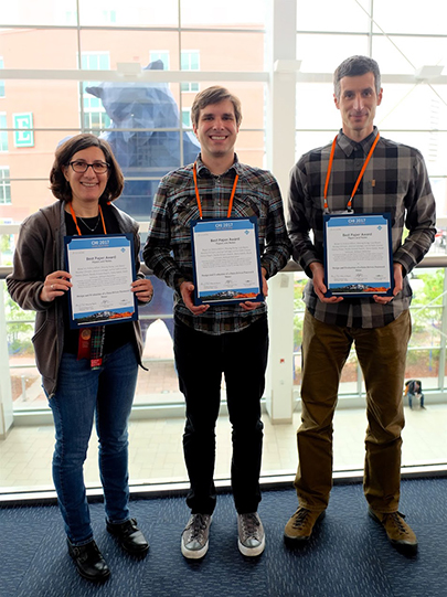 Lorrie Cranor, Blase Ur, and Lujo Bauer with their best paper awards.