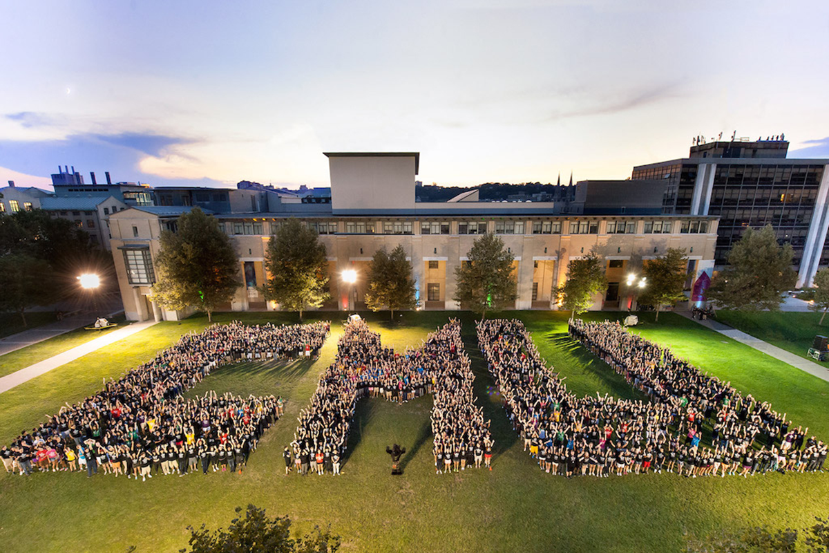 Overhead shot of students lined up in the shape of CMU