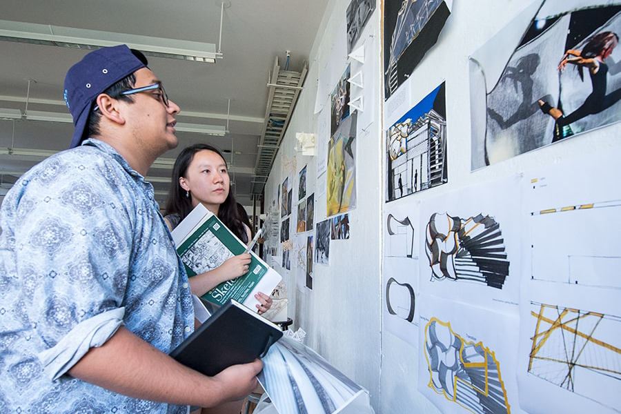 Engineering and arts students discuss their work at CMU's School of Architecture