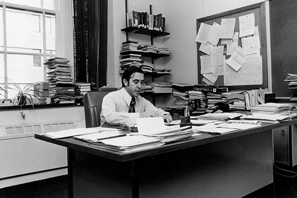 Angel Jordan at his desk