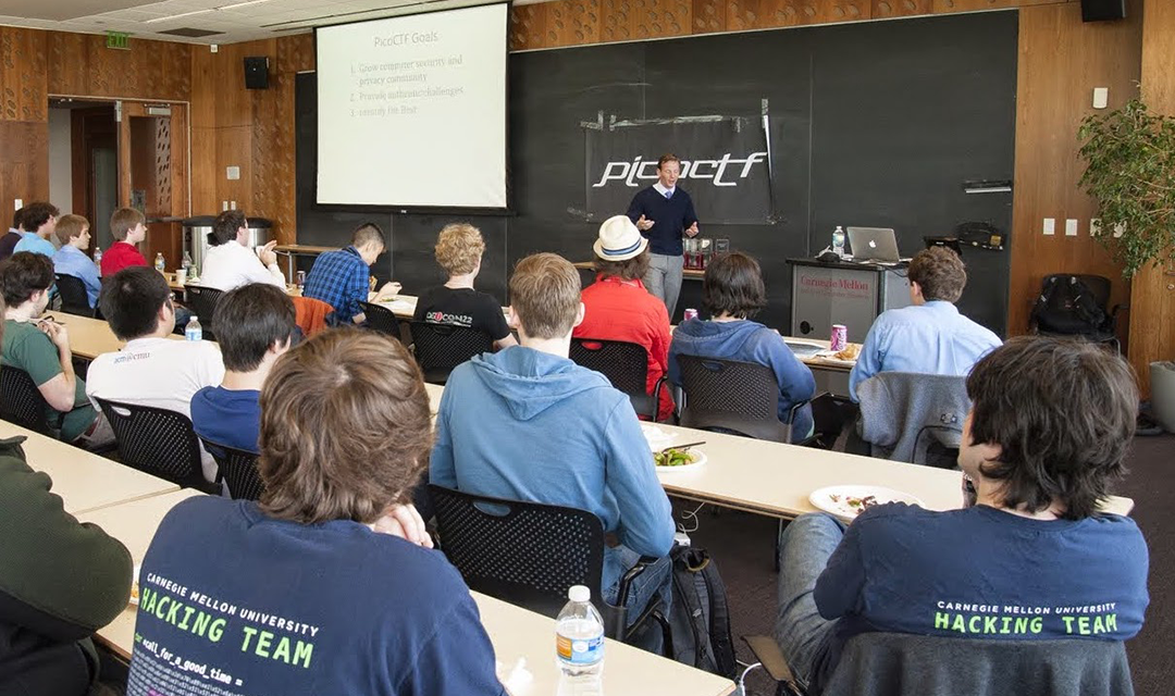 David Brumley talks about picoCTF in front of a classroom of students