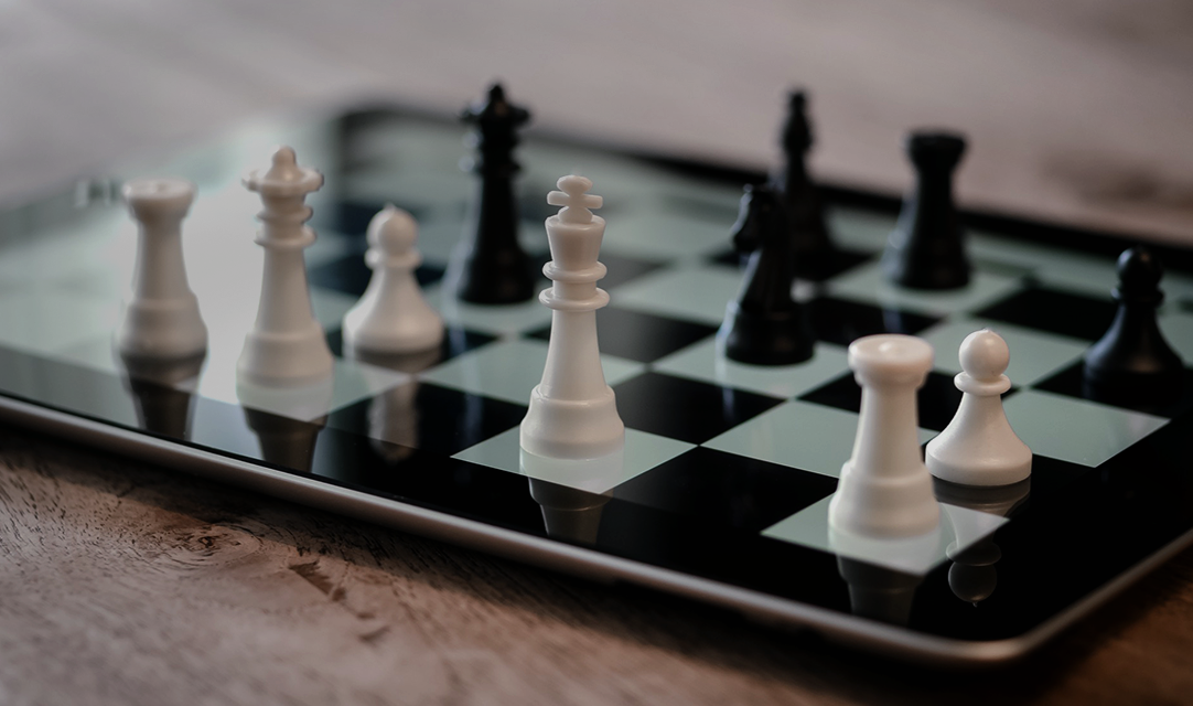 Chess pieces on an iPad