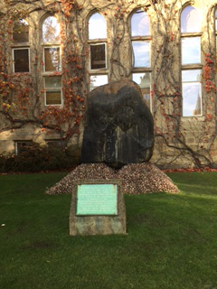 Boulder containing lava rock on University of Manchester's campus