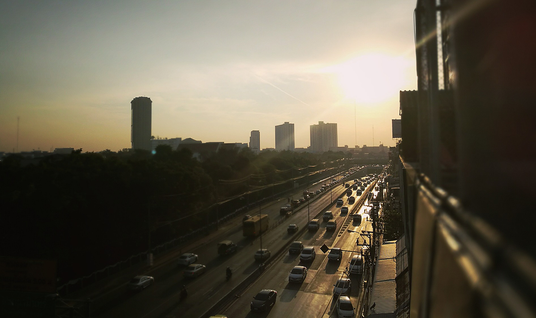 Traffic on highway at sunrise