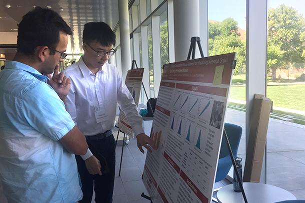 Jingxi Cai presenting his research poster