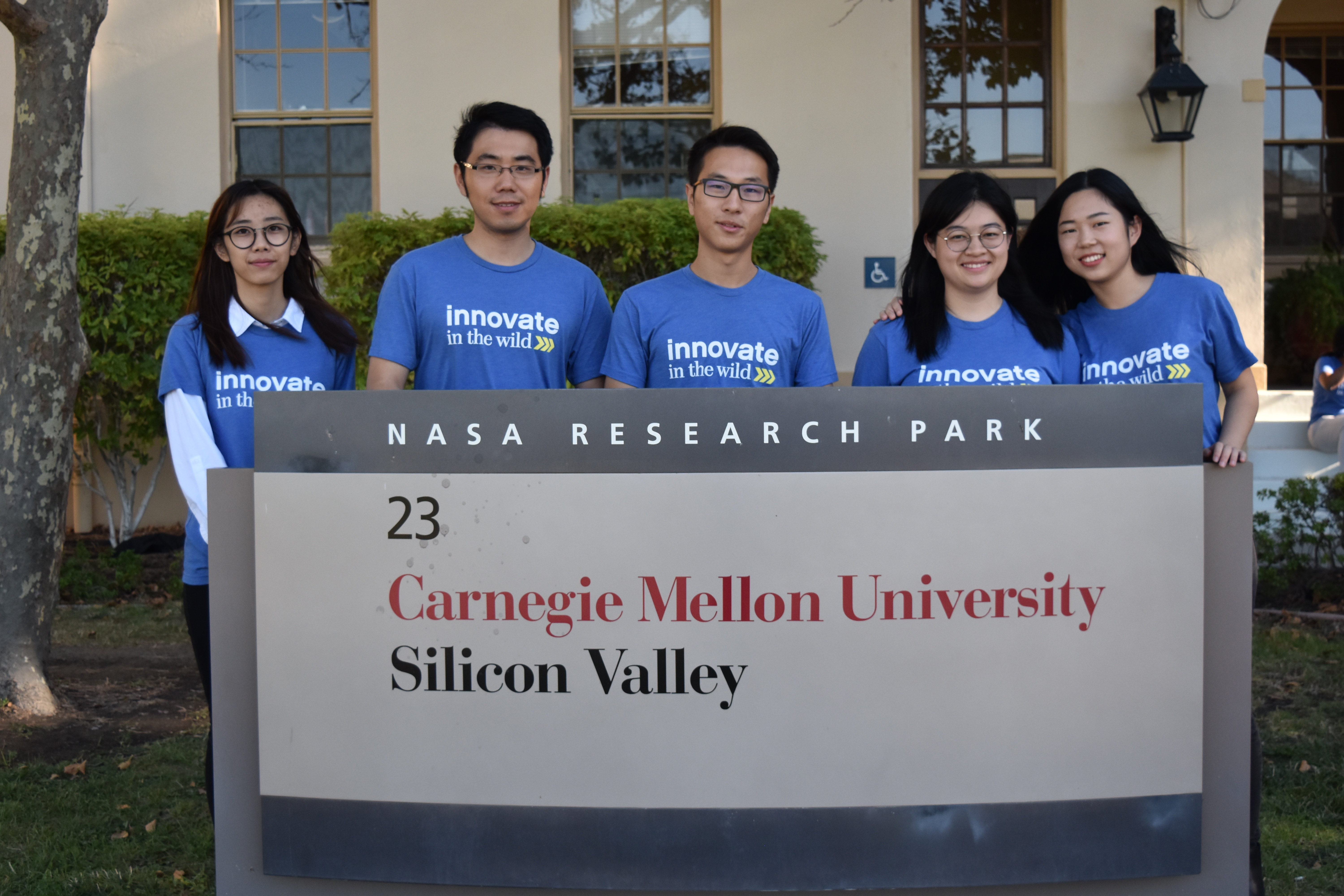 INI Master’s students Mimi Gong, Liangchen Yi, Zhongyi Tong, Zi Liang, and Weizi Liu pose with the NASA Research Park sign at CMU-SV