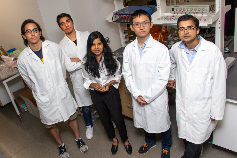 Jayan and students in the Far-from-Equilibrium Materials Laboratory.