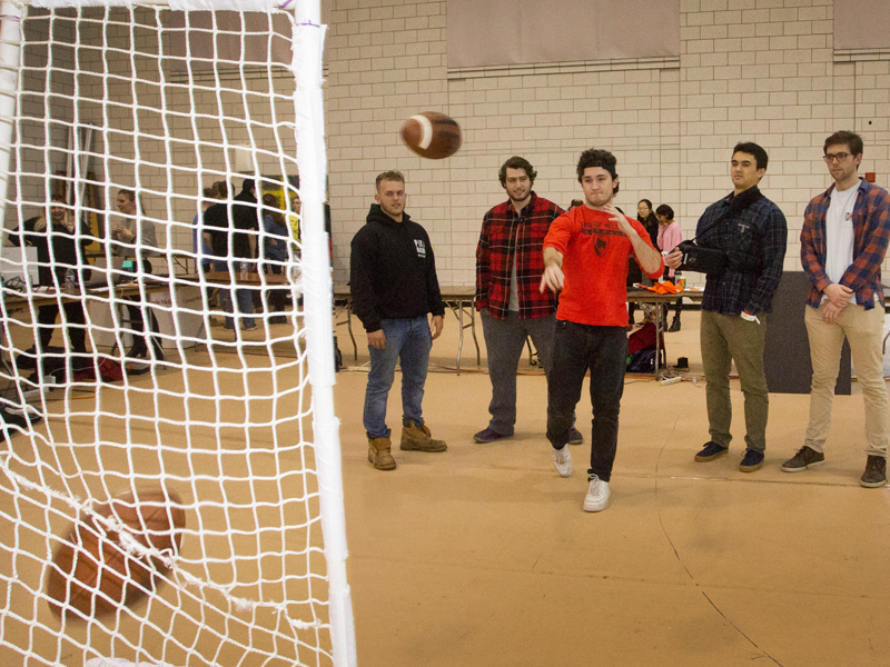 MechE students Lior Barhai, Justin Belardi, Alex Byrnes, Nicholas Calzolano worked with a teammate studying computer science to create a smart, mobile net to speed up football practice.