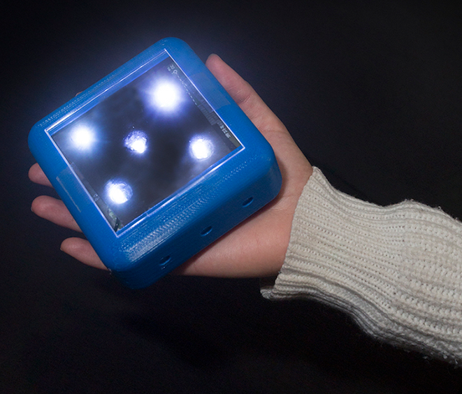 Sole-Tile prototype displayed in a hand