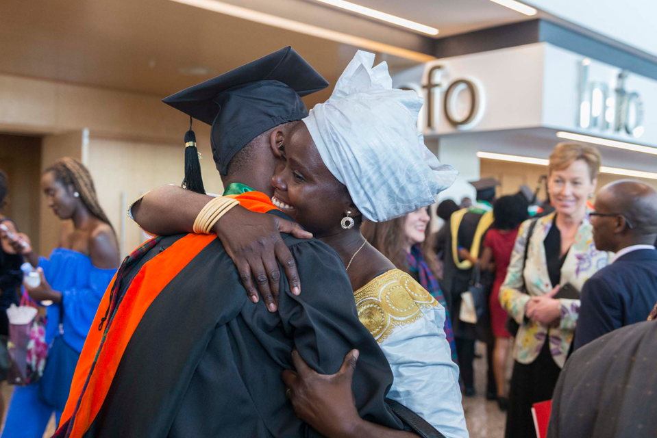 CMU Africa graduate celebrates graduation.