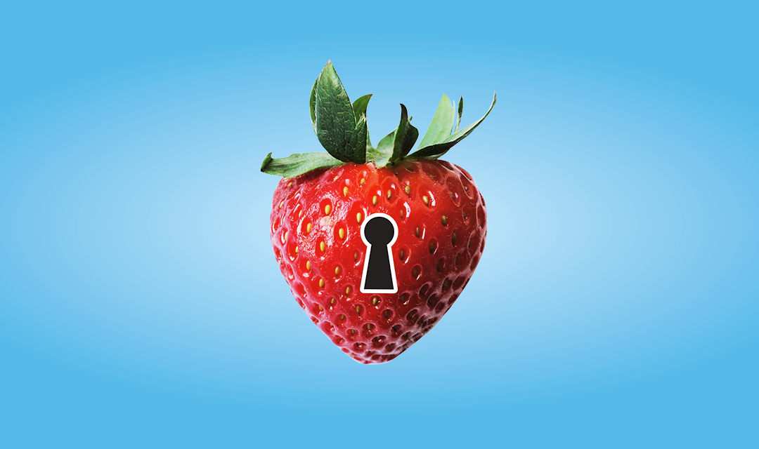 A graphic of a strawberry in a bottle with a keyhole in the strawberry