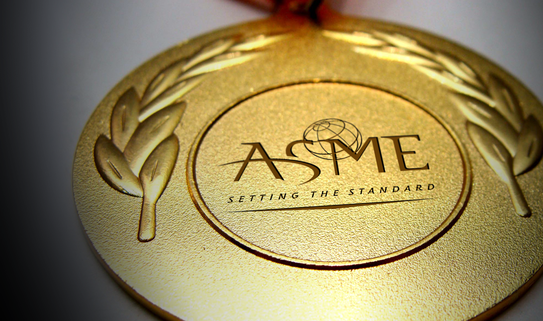 Gold ASME medal that says "setting the standard"