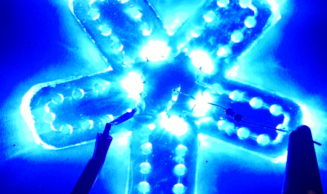 A fluorescent protein produced by engineered bacteria cells.