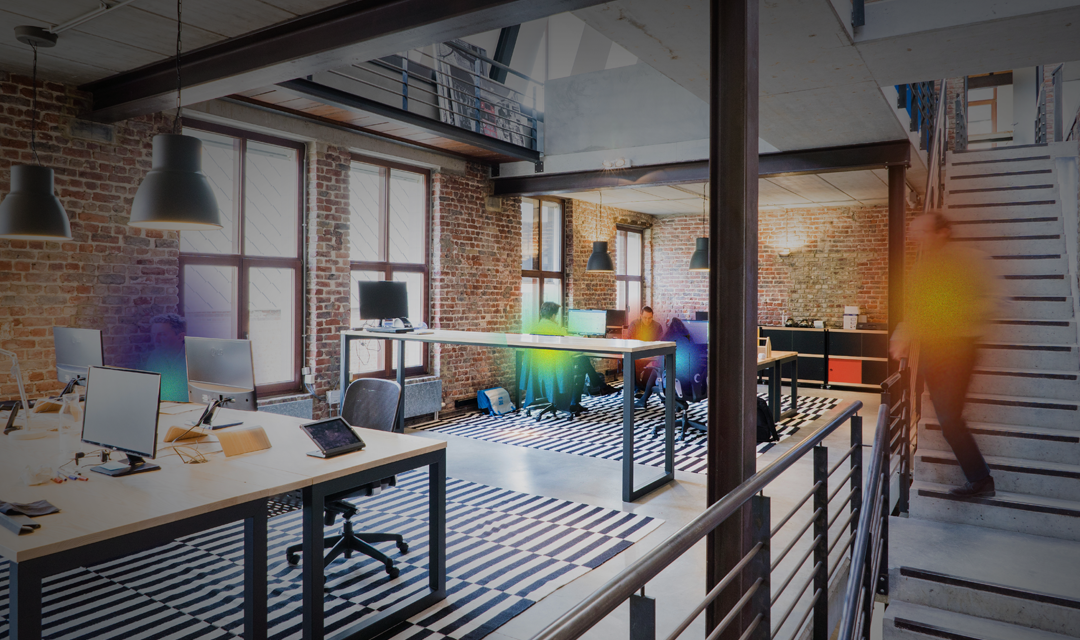 Modern office space with heat signatures over individuals