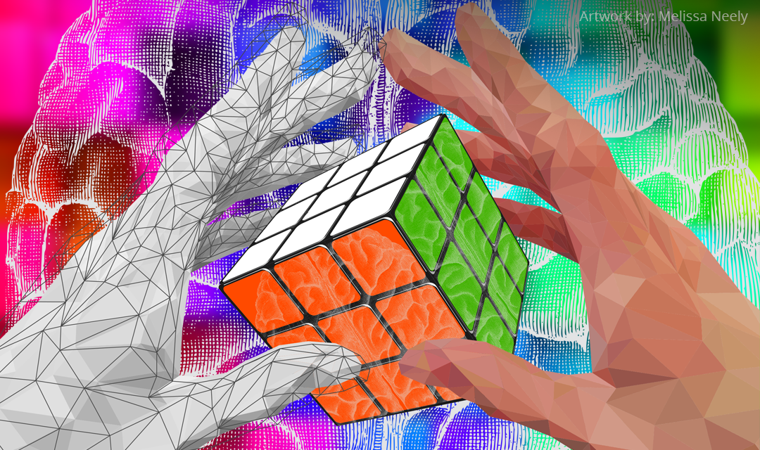Two hands holding a Rubik's cube