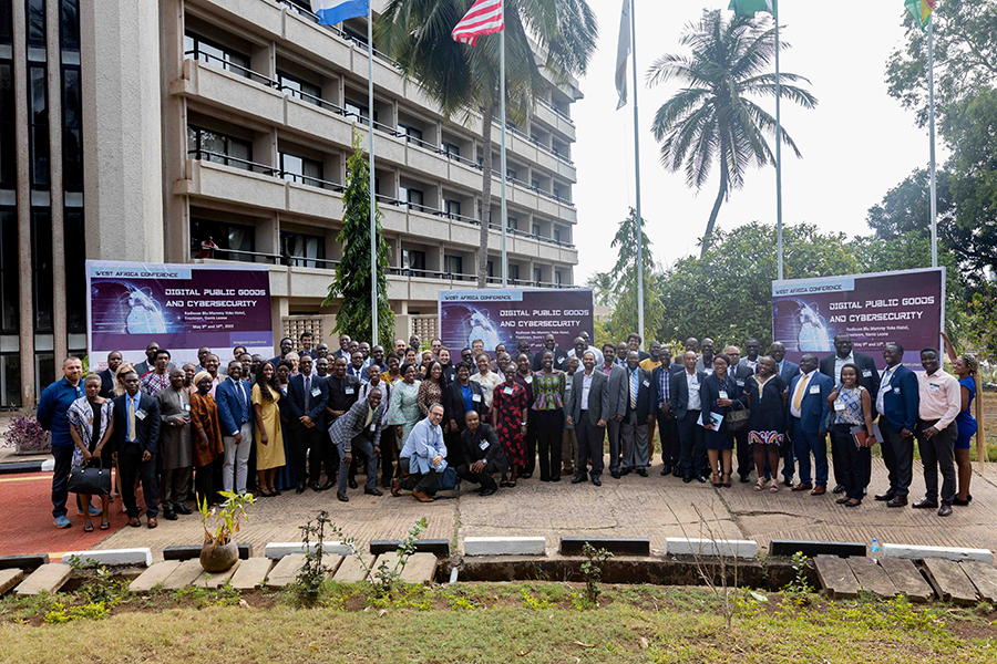 Outside group shot with the whole conference featuring around 100 people