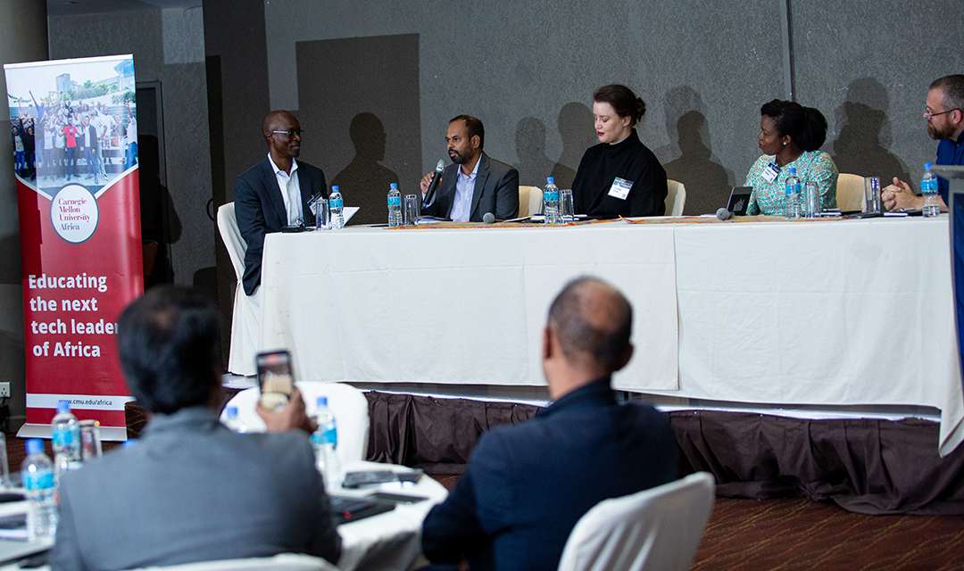 Speakers at the panel table