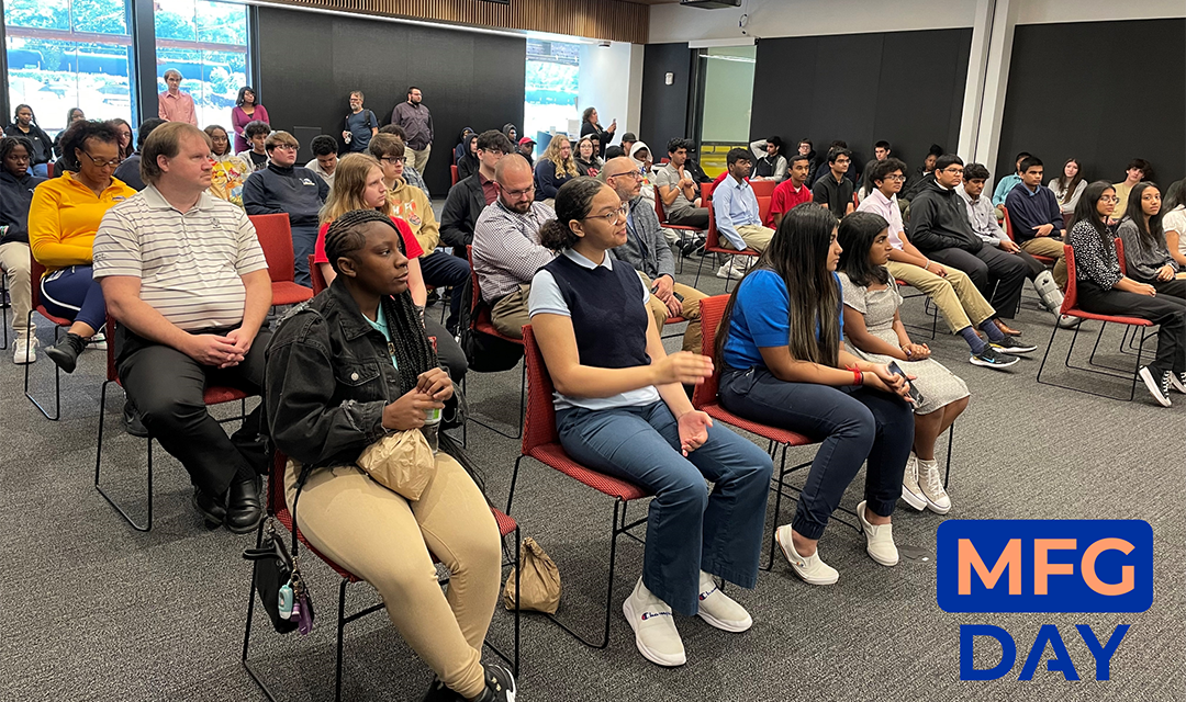 Group of students sitting in a room during manufacturing day events