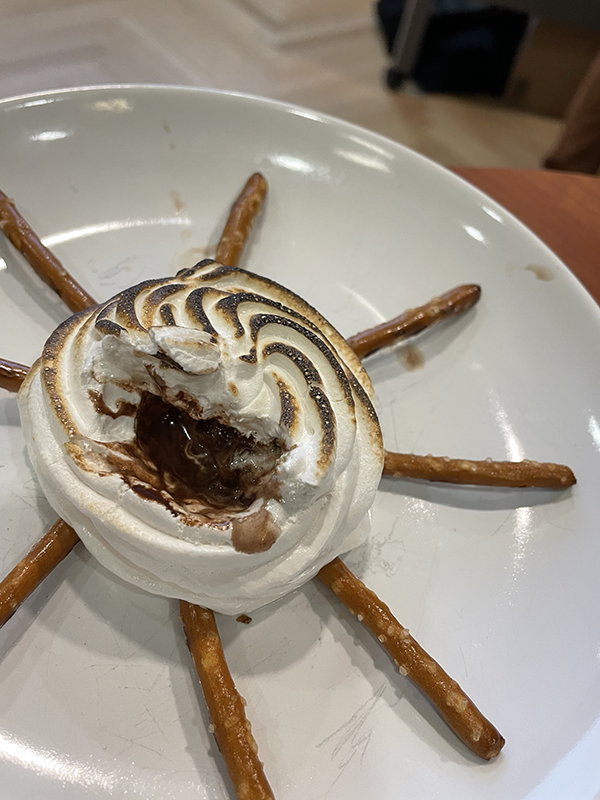 Toasted marshmallow fluff with a chocolate center surrounded by a spiral of pretzels 
