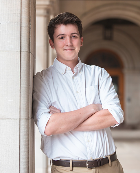 Ethan Meitz leaning against a wall