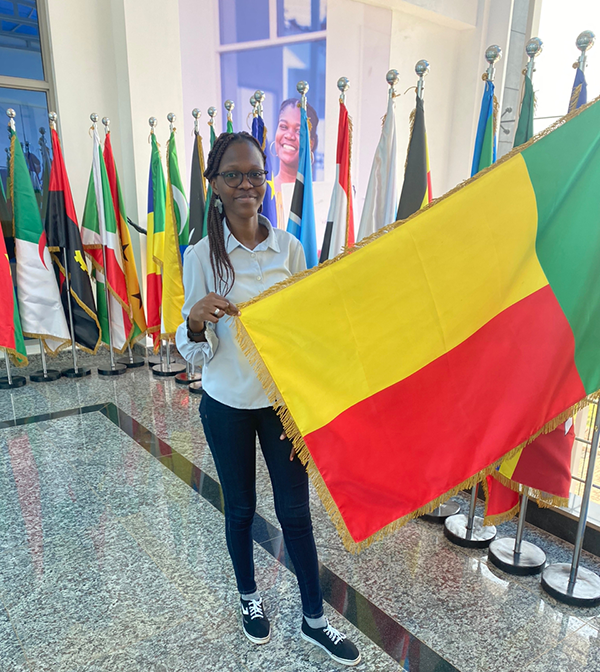 woman standing with a flag