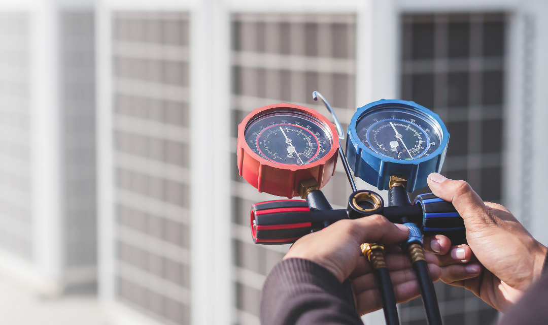 A thermostat with two gauges, one hot and one cold