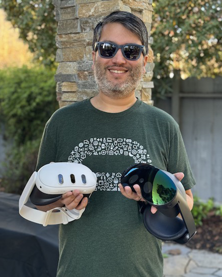 Ankur Gupta holding the augmented reality helmets