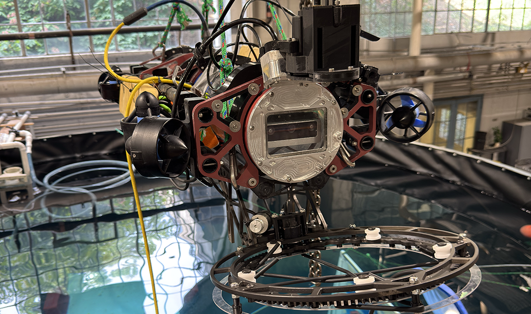 Large piece of equipment over a tub of water