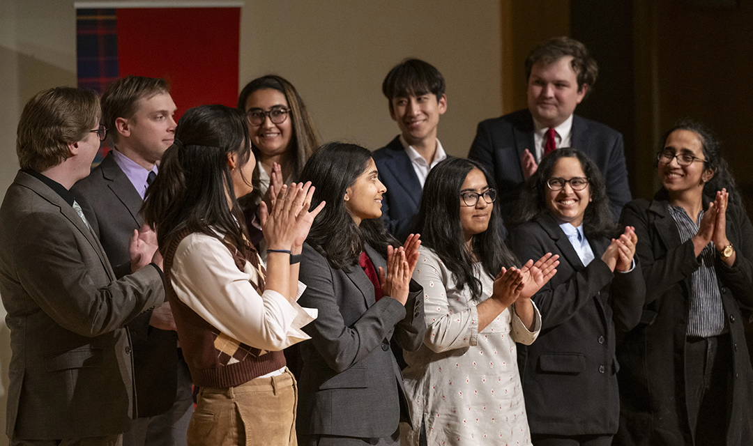 All the 3MT winners clapping