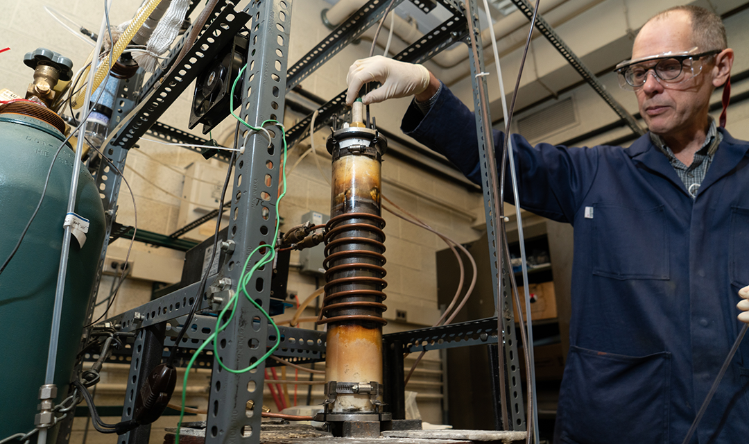 A man working in an iron and steelmaking lab