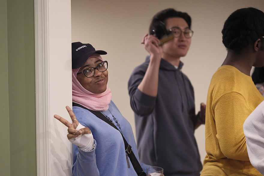 Three students in a doorway