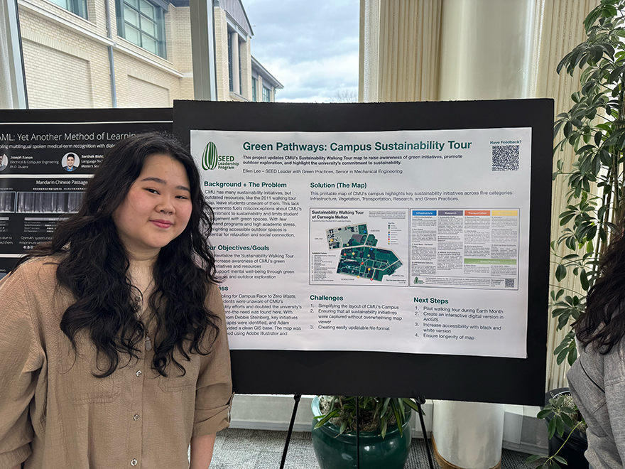 Student with Green Pathways project poster