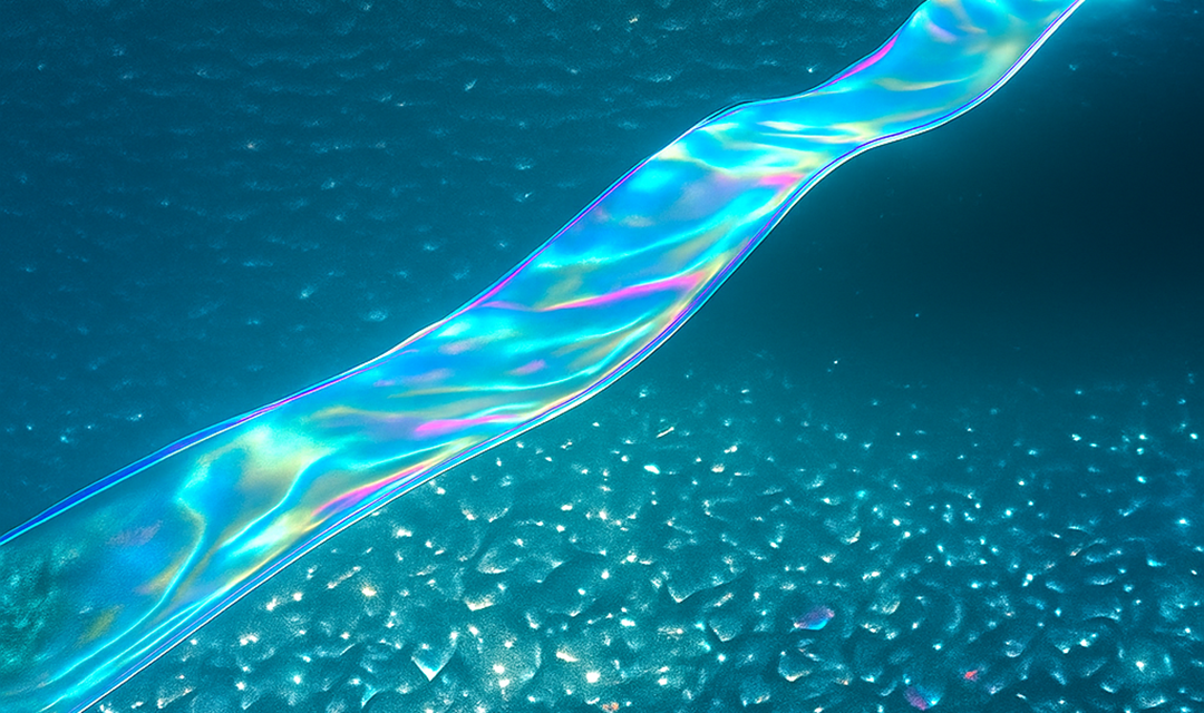 Activated polymer layer, which appears as a rainbow-colored, wavy strip