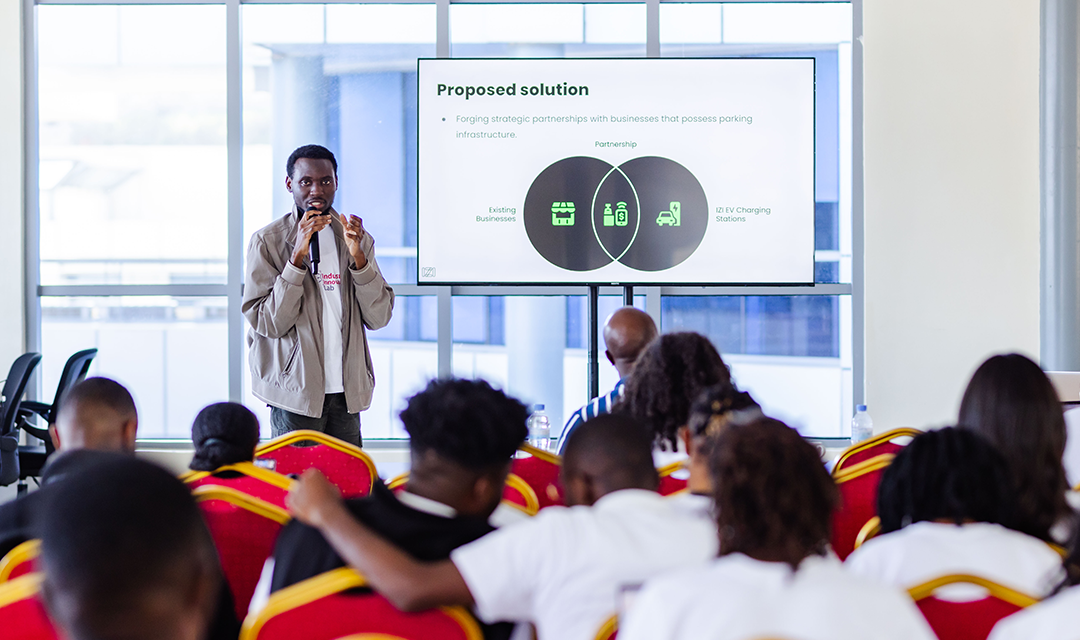 A man presenting to a group about innovation