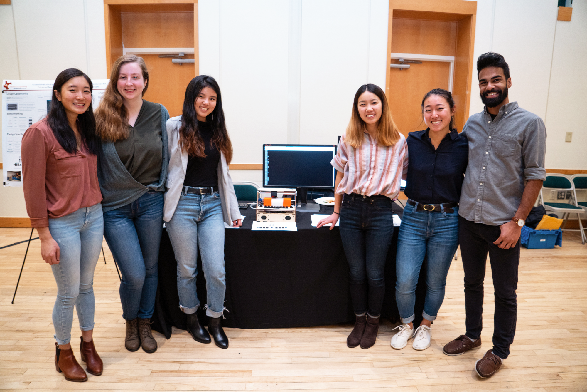 students pose for photo at MechE Design Expo