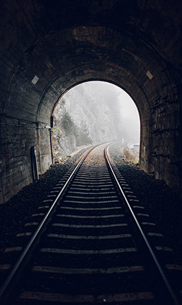 train tracks in tunnel