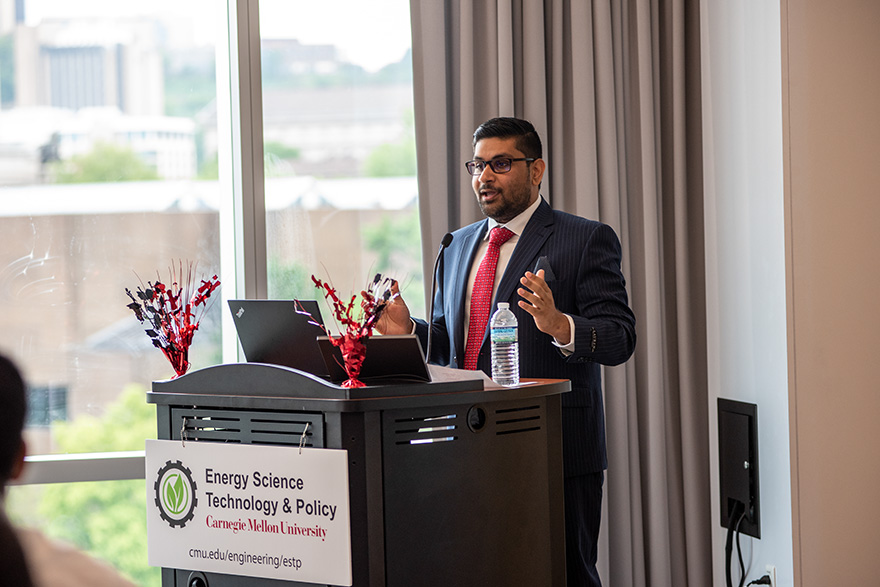 Alum, Raafe Khan, gives speech