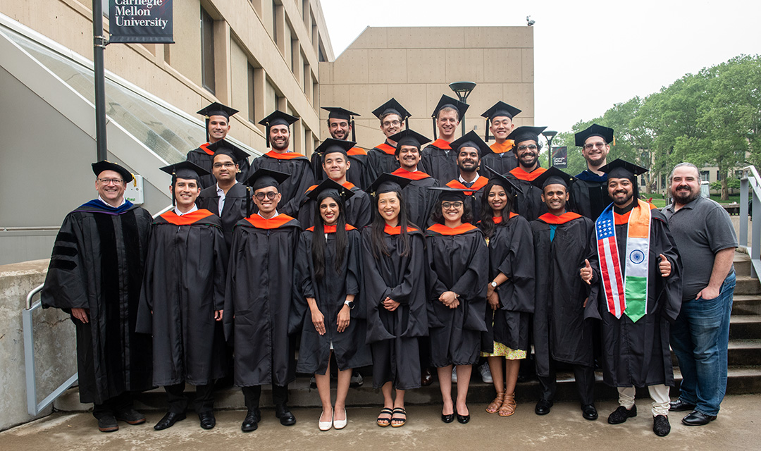 Graduating students pose for a photo