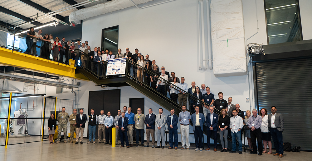 Group photo on steps inside Mill 19