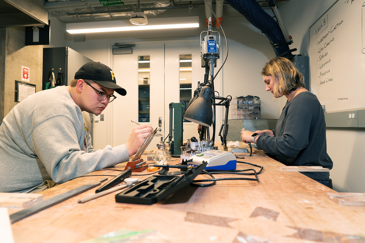 Students work in TechSpark's jewelry room